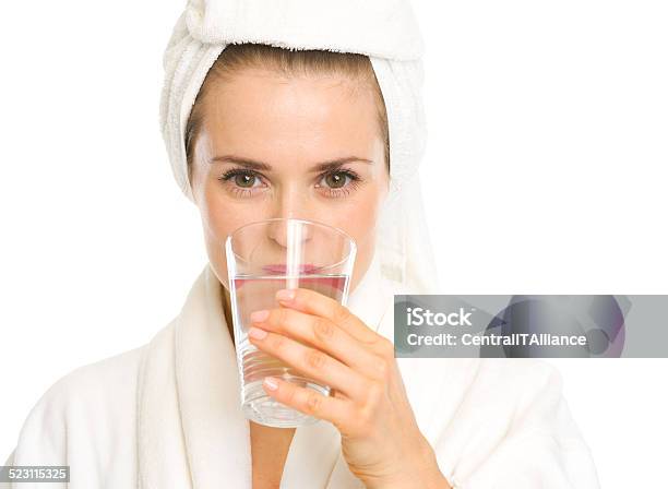 Young Woman In Bathrobe Drinking Pure Water Stock Photo - Download Image Now - Adult, Bathrobe, Beautiful People