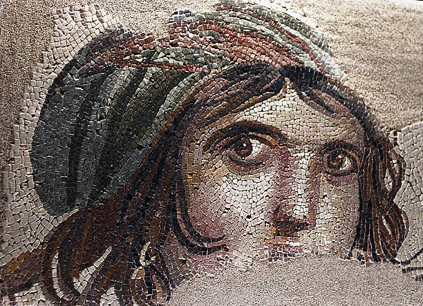 gypsy girl "Gypsy Girl" mosaic; Akratos, a goddess of the seasons and Earth Goddess of the recovered Satire named Gypsy Girl with traces of mosaic and mother of the gods Gaia or different views on that Alexander the Great. But among the people because of their hair weave mosaic "Gypsy Girl" is called, is on display at the Zeugma Mosaic Museum in Gaziantep, Turkey. gaziantep province stock pictures, royalty-free photos & images