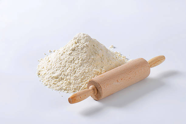 istock Pile of wheat flour and rolling pin 523131677