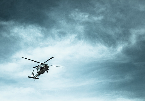 Helicopter In A Stormy Sky Stock Photo - Download Image Now - Helicopter,  Military, Security - iStock