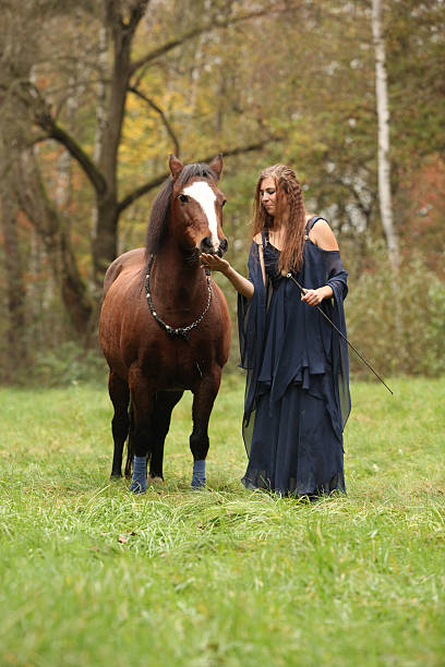 istock Pretty woman with pony - NHS 523133281