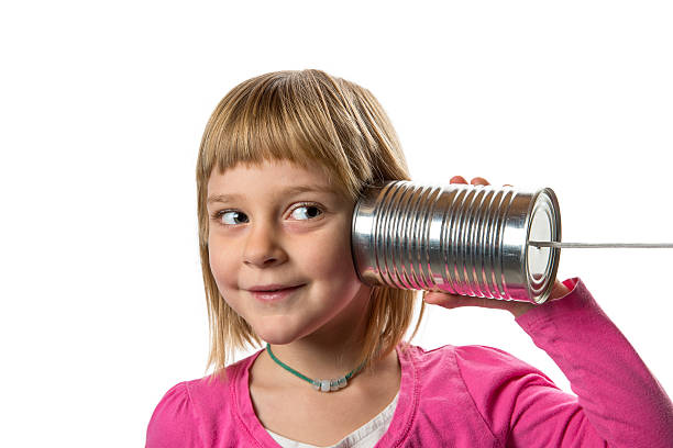 istock Girl with Tin Can Phone - Listening 523133581