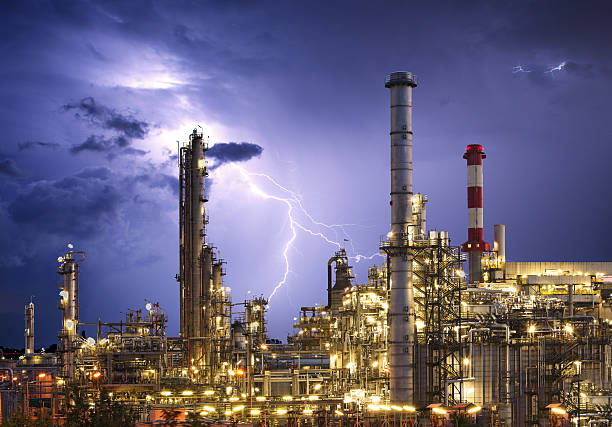 Factory - oil and gas industry Factory - oil and gas industry lightning tower stock pictures, royalty-free photos & images