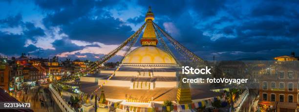 Prayer Flags Buddhist Stupa Illuminated Panorama At Boudhanath Kathmandu Nepal Stock Photo - Download Image Now