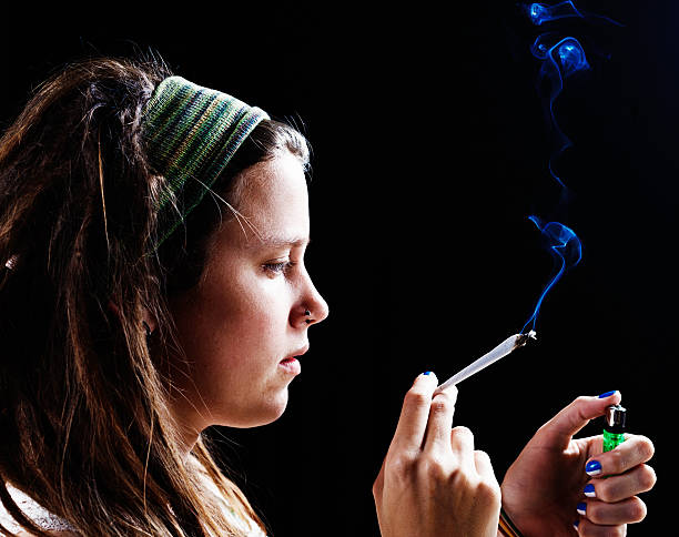 istock Pretty woman trying marijuana 523137129