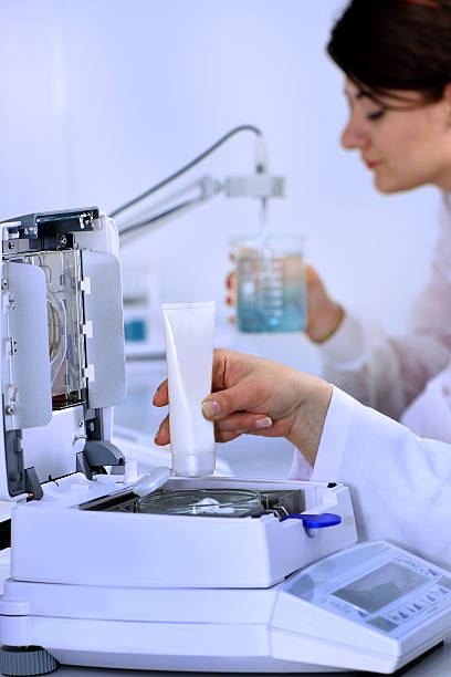 istock Measuring Creams on Laboratory Weighing Balance 523137843