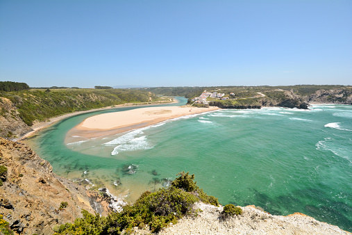 Panoramic view to Praia de Odeceixe, Surfer beach on the West coast of Algarve, District Aljezur Portugal