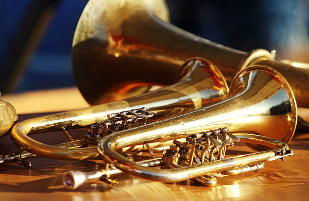 Wind instruments on table Blowing brass wind instrument on table brass instrument stock pictures, royalty-free photos & images