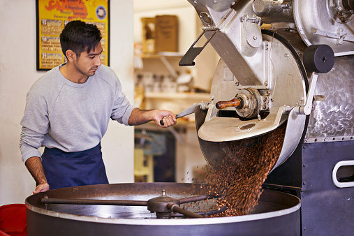 Shot of a machine grinding and roasting coffee beanshttp://195.154.178.81/DATA/shoots/ic_784230.jpg