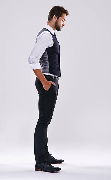 Looking suave Studio shot of a handsome and well-dressed young manhttp://195.154.178.81/DATA/shoots/ic_784174.jpg man standing profile stock pictures, royalty-free photos & images