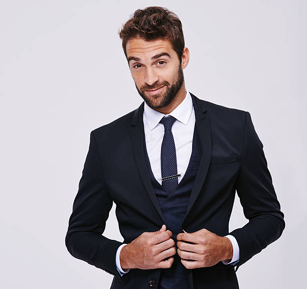 He's a sophisticated man Studio shot of a handsome and well-dressed young manhttp://195.154.178.81/DATA/shoots/ic_784174.jpg tuxedo photos stock pictures, royalty-free photos & images