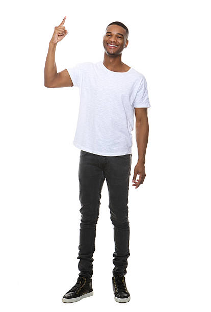 Smiling man pointing finger showing copy space