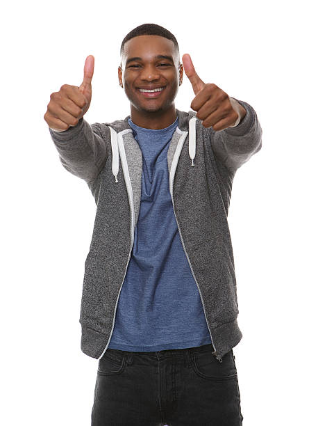 istock Happy young man with thumbs up gesture 523148557