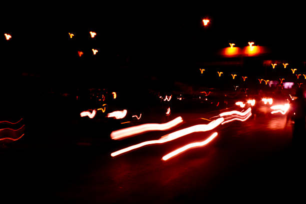 istock Driving at night city light trails 523148613