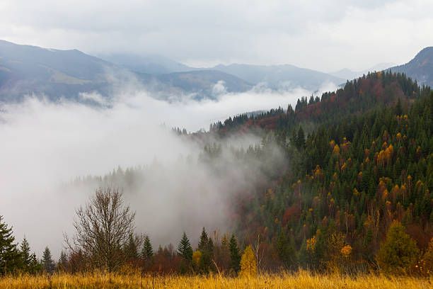 istock global warming. mountain landscape. Clouds and fog 523148791
