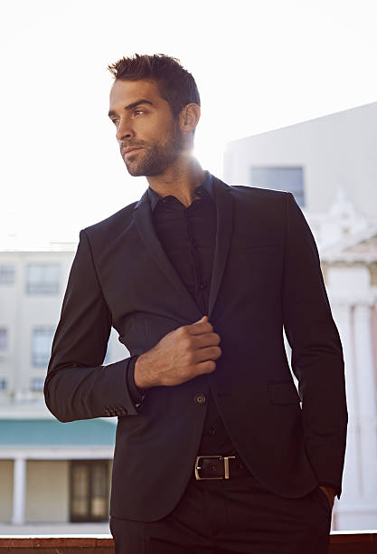 Style is primarily a matter of instinct Cropped shot of a handsome and confident young man primarily stock pictures, royalty-free photos & images