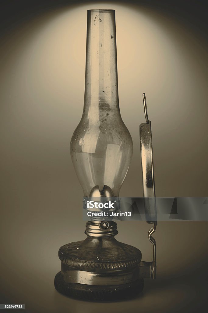 old kerosene lamp isolated on white background old kerosene lamp with mirror isolated on white background - retro Ancient Stock Photo