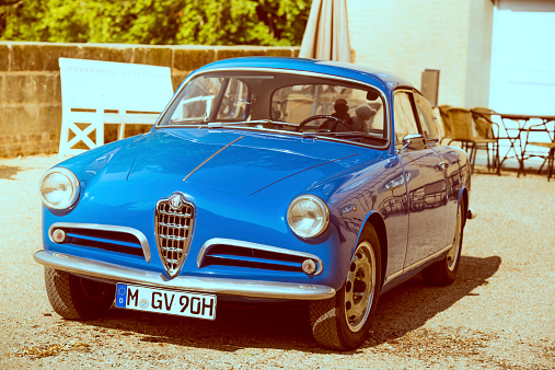 Jüchen, Germany - August 1, 2014: Vintage blue Alfa Romeo 1900 Coupe classic car on display during the 2014 Classic Days event at Schloss Dyck.