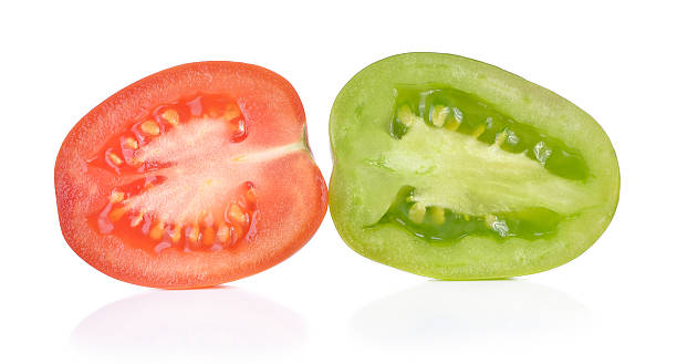 istock Red and Green tomato on white 523155692