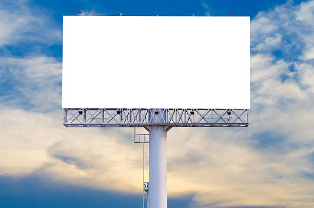 istock Blank billboard ready for new advertisement with blue sky backgr 523155820