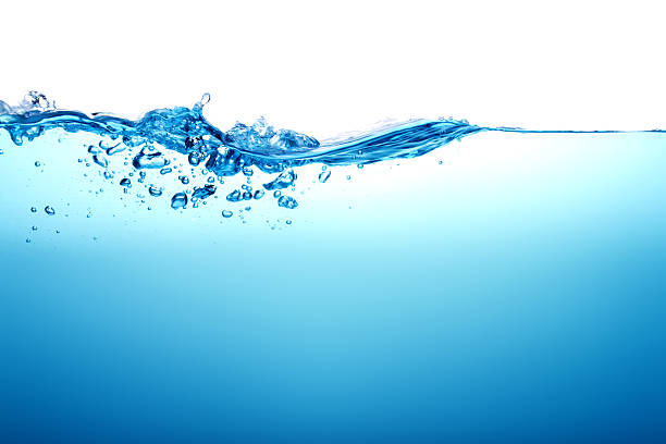 istock Close up blue Water splash with bubbles on white background 523157078