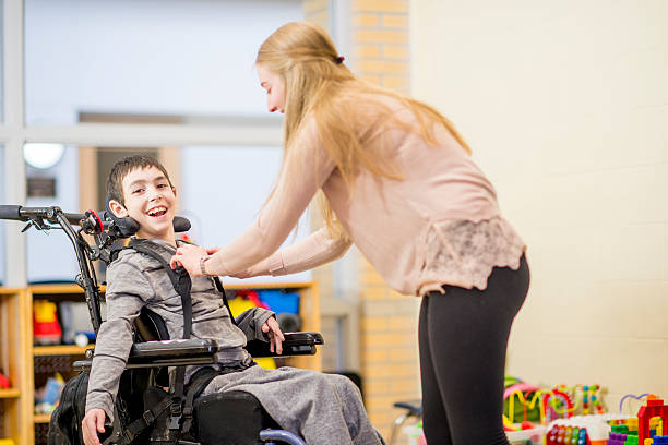 istock Strapping into a Wheelchair 523157890