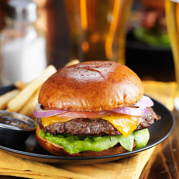 istock cheeseburger and fries on plate 523161384