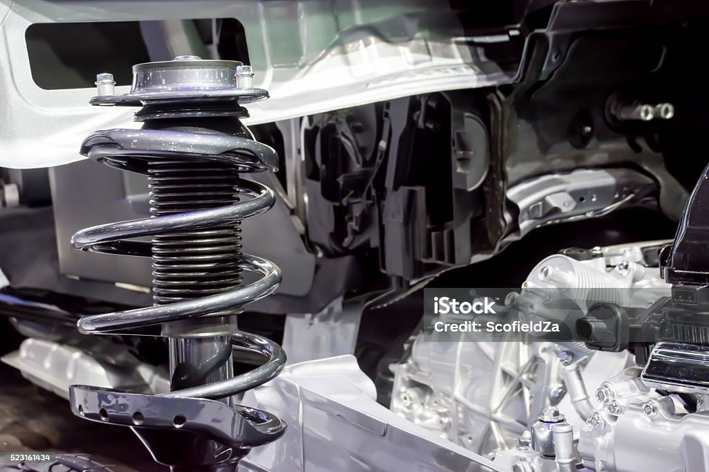 Shock Absorber and car suspension in background Activity Stock Photo