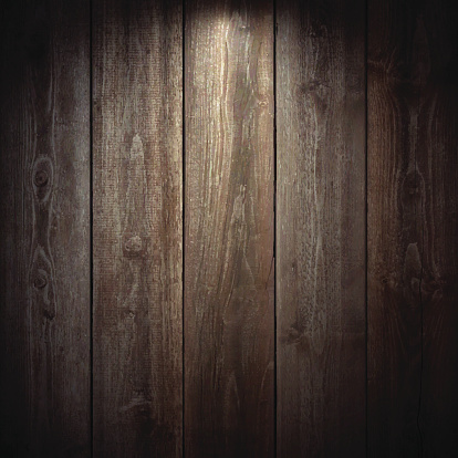 Lit realistic wooden wall.