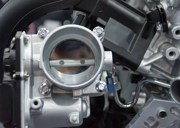 The closed up of throttle body and engine The closed up of throttle body and engine throttle stock pictures, royalty-free photos & images
