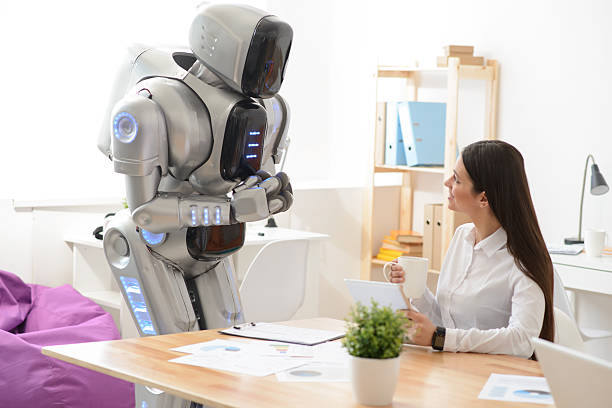 istock Pleasant girl talking with robot 523163762