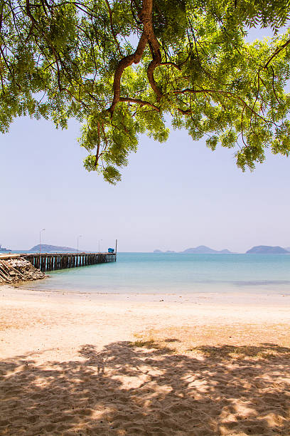 istock Bridge pier extending into the sea 523166282