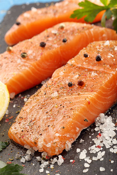 istock Fresh salmon with herbs and spices 523166742