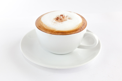 cappuccino with coffee beans