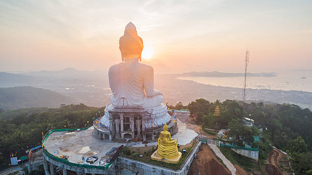 istock The sun shines in front of big Buddha. 523169162