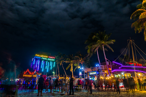 Koh Phangan, Thailand - October 8, 2014: The Full moon party at Haad Rin, Koh Phangan, Thailand. The Full Moon Party is an all-night beach party that originated in Haad Rin on the island of Ko Pha Ngan, Thailand on the night of, before or after every full moon. It is mostly attended by tourists.