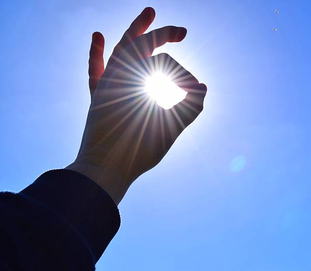 istock ok hand sign holding the sun 523171728