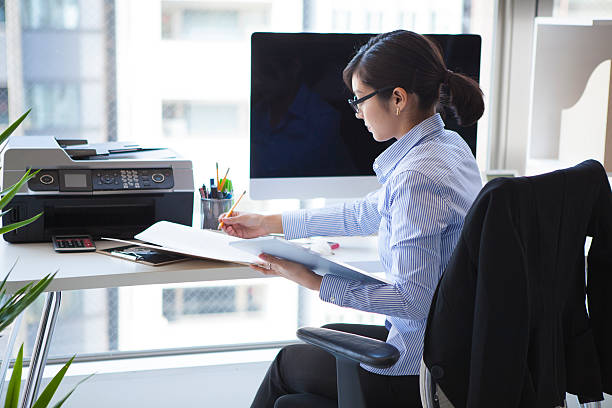 istock Women who are corrections to the documentation 523171814