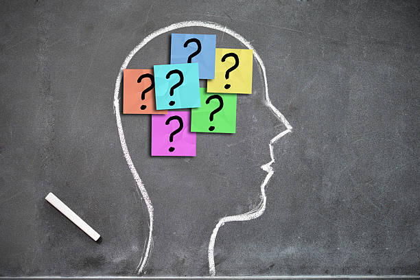 istock Human head shape with lots of question marks on stickers 523173312