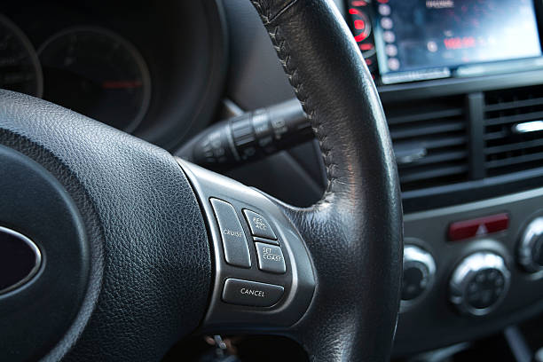 istock Cars wheel with switch of cruise control, close, selective focus 523173776