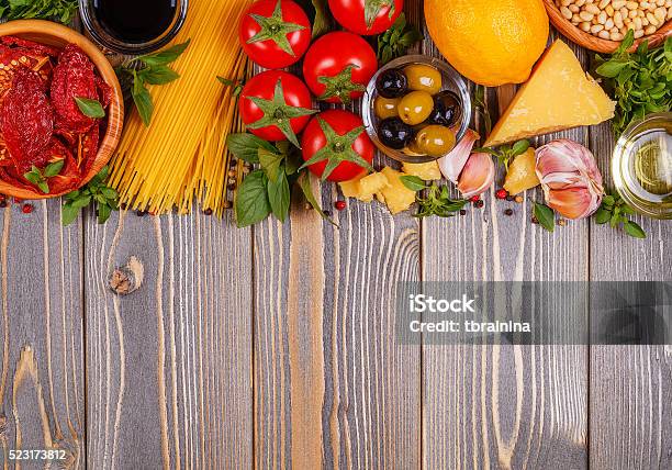 Italian Food Background Ingredients On Wooden Table Stock Photo - Download Image Now