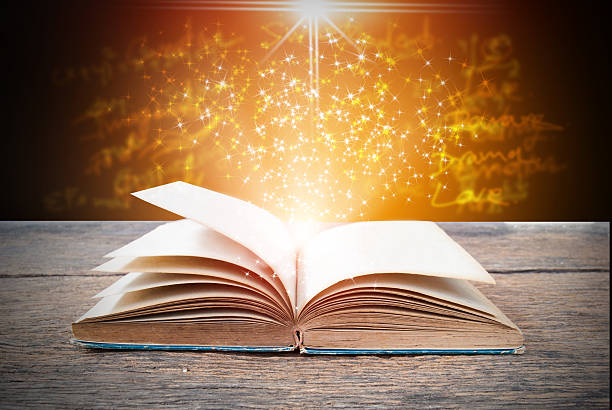 istock Abstract magic book on wooden background 523174230