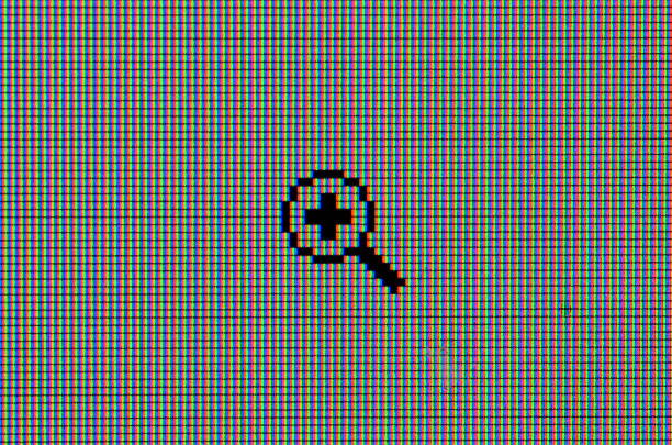 Macro detail of computer cursor magnifier on the screen formed by RGB pixels