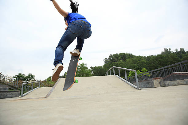 istock skateboarder skateboarding at skatepark 523179940