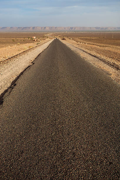 istock Straight desert road in Morocco, Africa 523180671