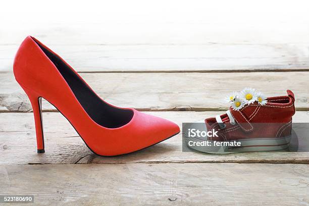 Red Kids Sneakers With Daisies And Mums Red High Heels Stock Photo - Download Image Now