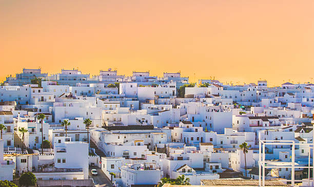 Vejer de la Frontera in Andalusia, Spain A nice sunset of a white town, Vejer de la Frontera in Andalusia, Spain. cadiz province stock pictures, royalty-free photos & images
