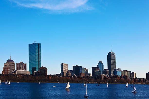 istock Boston, Massachusetts skyline with sailboats in foreground 523182926