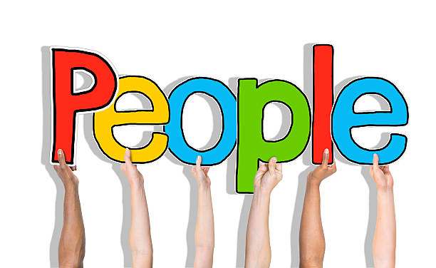 istock Diverse People's Hands Holding Word People 523183551