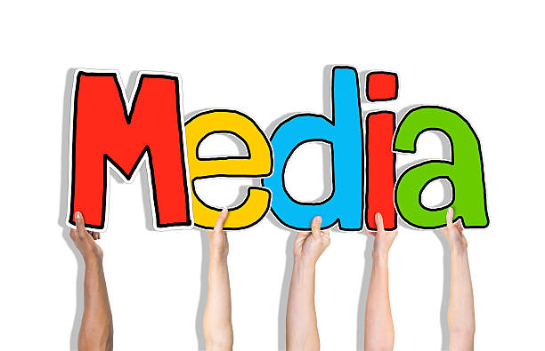 istock Diverse People's Hands Holding Word Media 523183561